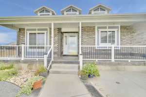 Property entrance featuring a porch