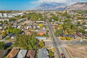 Birds eye view of property with a mountain view