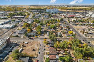 Birds eye view of property with a mountain view