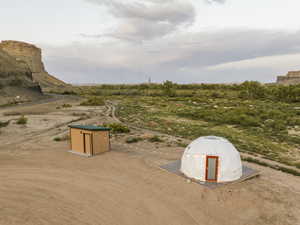 View of yard featuring a storage unit