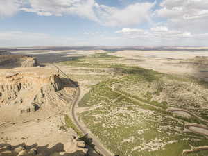 Birds eye view of property with a rural view