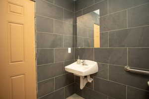 Bathroom with tile walls