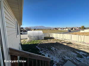 View of yard with a mountain view