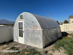 View of outdoor structure featuring a mountain view