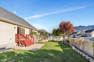 Wide stairs lead to beautiful back yard