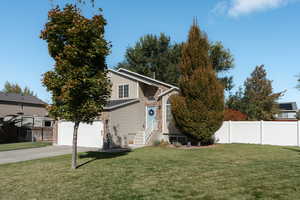 View of front of house with a front yard