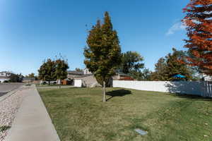 View of yard featuring a garage