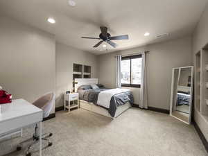 Bedroom featuring carpet floors and ceiling fan