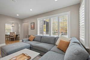 Living room with wood-type flooring