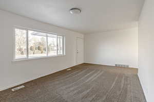 View of carpeted empty room