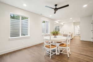 Dining area featuring light hardwood / wood-style flooring and ceiling fan