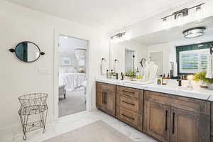 Bathroom featuring vanity and a textured ceiling