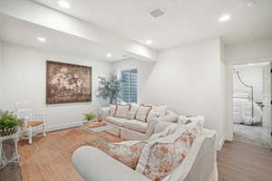 Living room featuring hardwood / wood-style floors