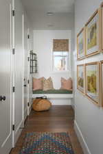 Interior space featuring dark hardwood / wood-style floors and a textured ceiling