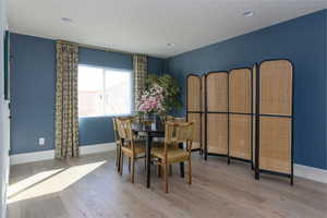 Dining room with light wood-type flooring