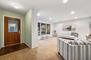 View of carpeted foyer