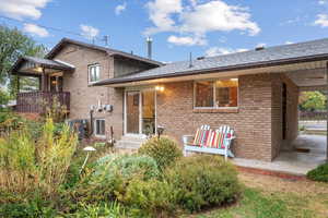 Back of property featuring a balcony