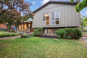 View of front of property featuring a front yard