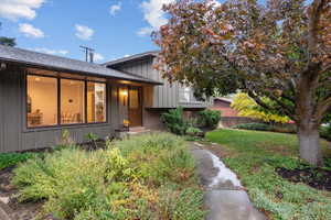 View of front of house featuring a front lawn