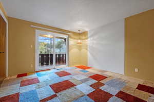 Empty room featuring carpet flooring