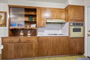 Kitchen featuring white appliances