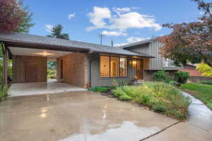 View of front of house with a carport