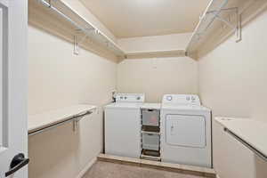 Large Master Closet with Washer/Dryer and floor drain