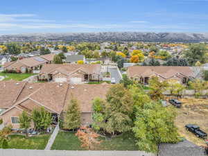 Birds eye view of property with a mountain view