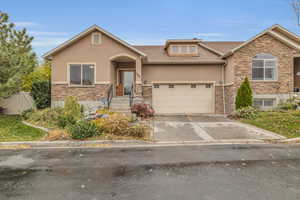 View of front of property with a garage