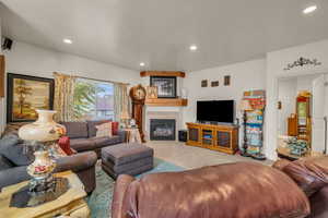 Living room featuring light colored carpet