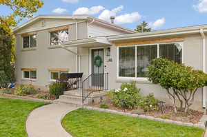 View of front of home with a front lawn