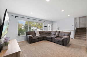 Living room with light colored carpet