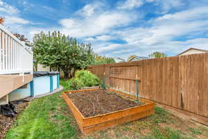 View of yard featuring a covered pool