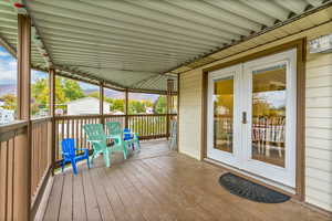 Wooden terrace with french doors