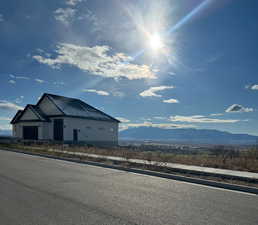 Exterior space featuring a mountain view