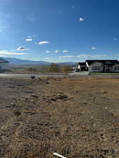 Property view of mountains featuring a rural view