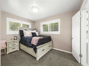 Bedroom 3 with multiple windows and a 3/4 bathroom.