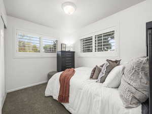 Bedroom 1 with dark carpet