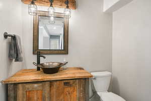 Bathroom with vanity and toilet