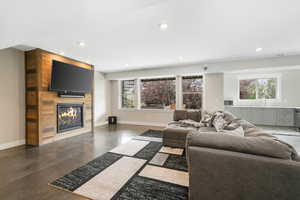 Living room with sink and plenty of natural light