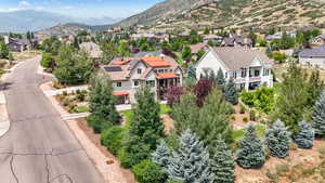 Birds eye view of property featuring a mountain view