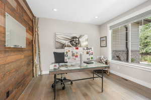 Office space featuring hardwood / wood-style floors