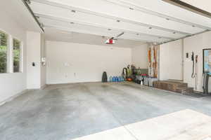 Garage with charger and room for two vehicles