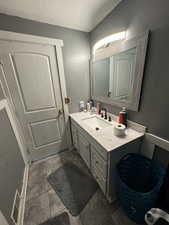 Bathroom featuring vanity and tile patterned flooring