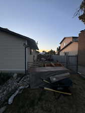 View of yard at dusk