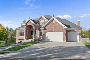 View of front of home featuring a garage