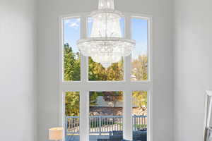 Room details featuring a notable chandelier