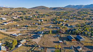 Drone / aerial view featuring a mountain view