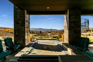 View of patio / terrace featuring a mountain view