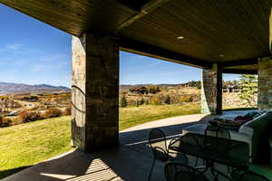 View of patio / terrace featuring a mountain view